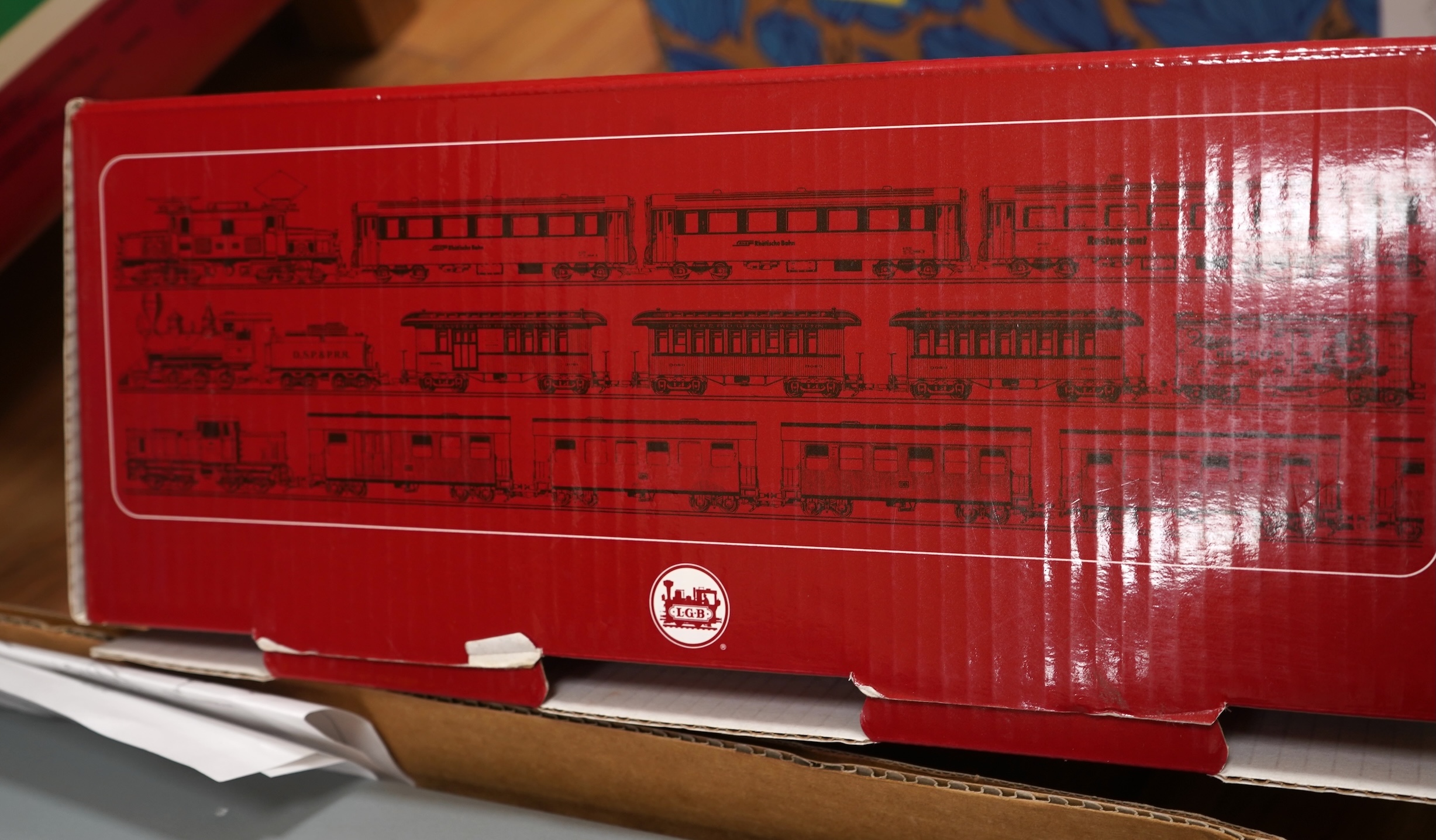 Four Lehmann and Bachmann G scale (45mm gauge) freight wagons; an unconstructed Bachmann Big Haulers G Kits 4-door Baggage Car (98910), an LGB 4-wheel coach in associated box, plus two others by Lehmann Toytrain in assoc